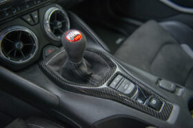 EOS 2016-2021 Chevrolet Camaro Carbon Fiber Center Console Gear Shift Box Panel - Image 1