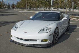 EOS 2005-2013 Chevrolet Corvette C6 Base ZR1 Hydro-Dipped Carbon Fiber Front Splitter Lip & Side Skirts - Image 1