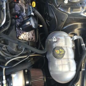 UPR Products 2015-2023 Ford Mustang GT Single Valve Hellion Oil Catch Can Separator Plug N Play™ - Image 1