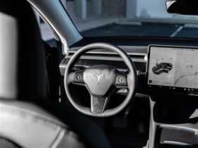 Brand: Tesla Model 3 / Y Carbon Fiber Steering Wheel Trim