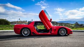 Red Corvette C5 lambo doors closeup detail