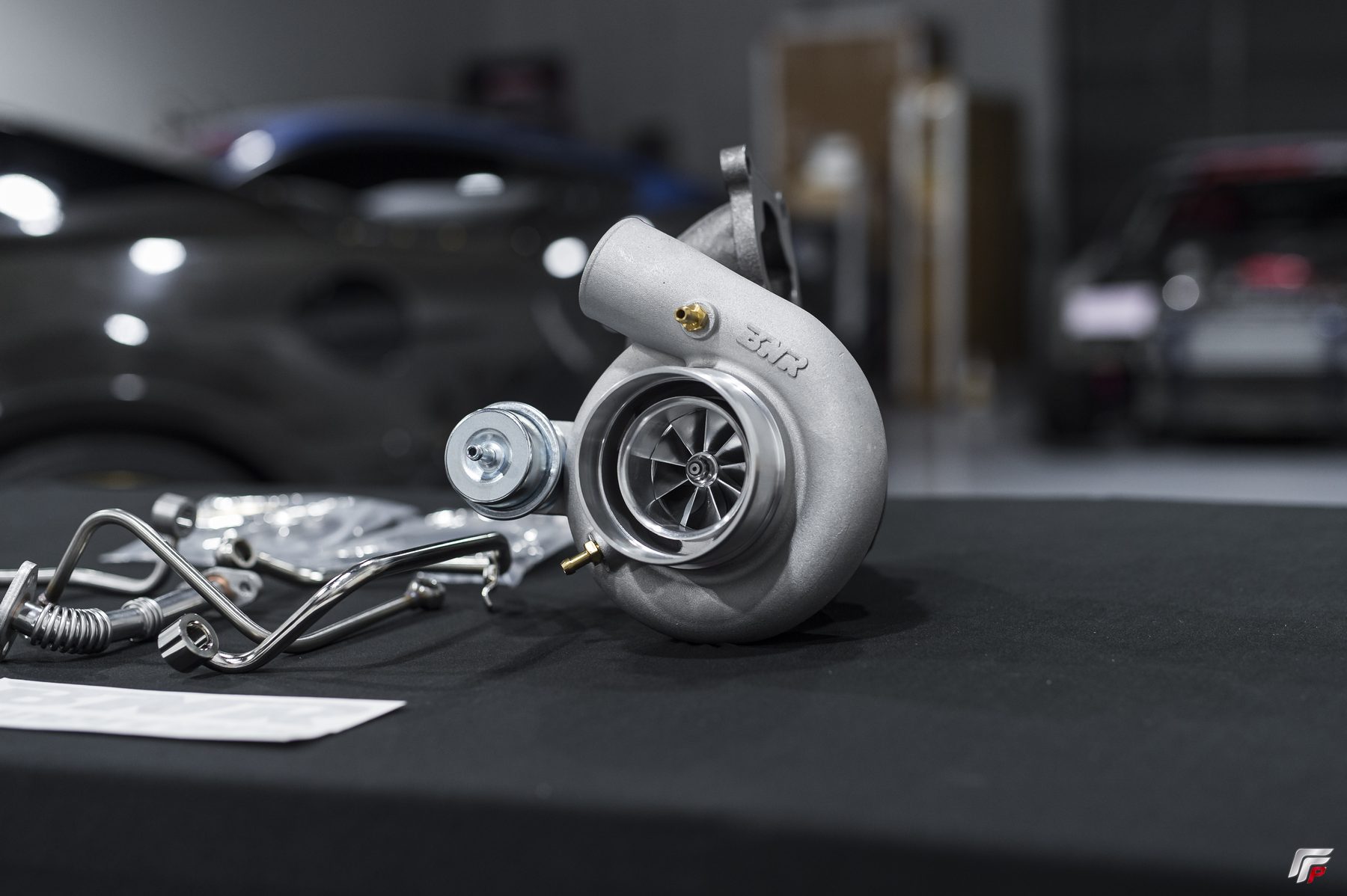 BNR 600 V2 turbo hero shot at FFP HQ with cars in background