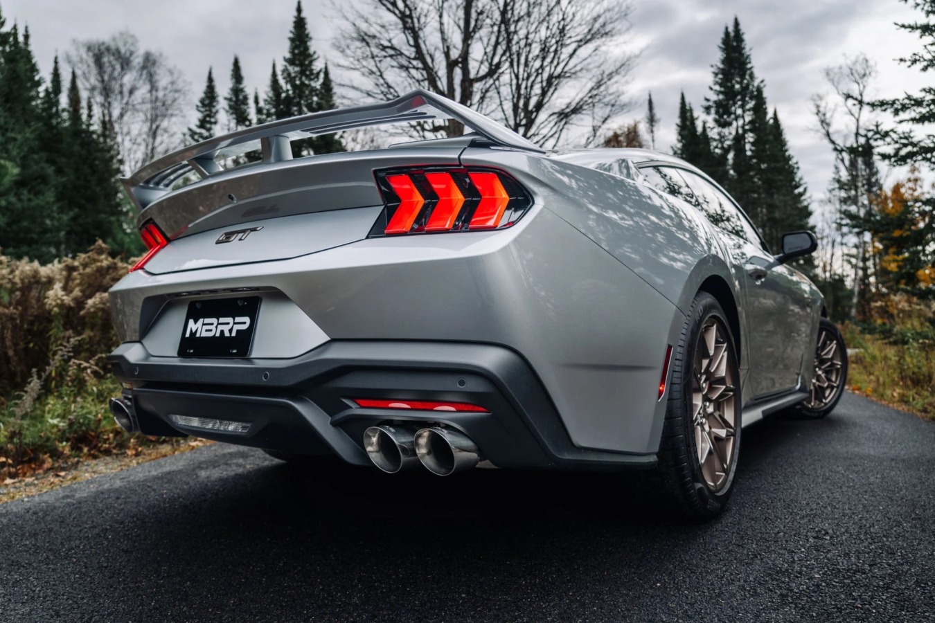 2024-2026 Ford Mustang GT with MBRP Armor Pro cat-back exhaust on the road